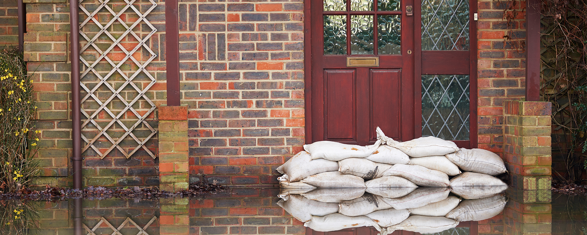 house with sand bags near door
